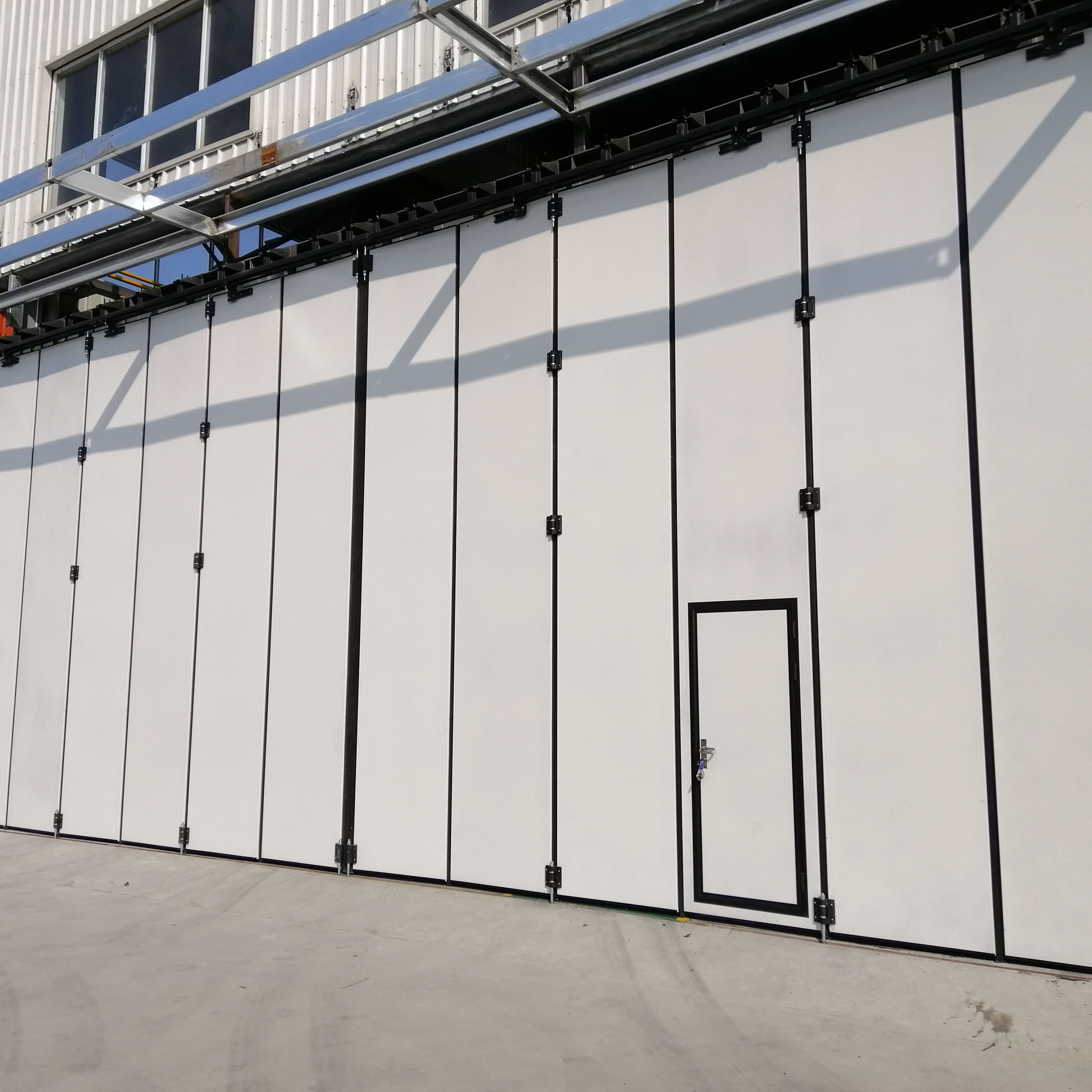 Large Opening Automatic Folding Door for Hangars and Warehouses